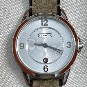 Coach Watch with box and original tag- working, new battery, good condition.